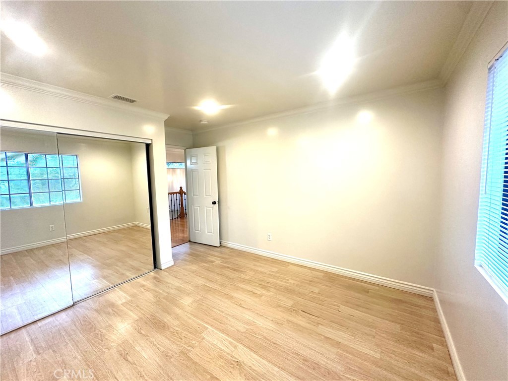 9356 19th Street, Unit A Rancho Cucamonga, CA 91701 - Photo 17 of 23 a view of an empty room and window