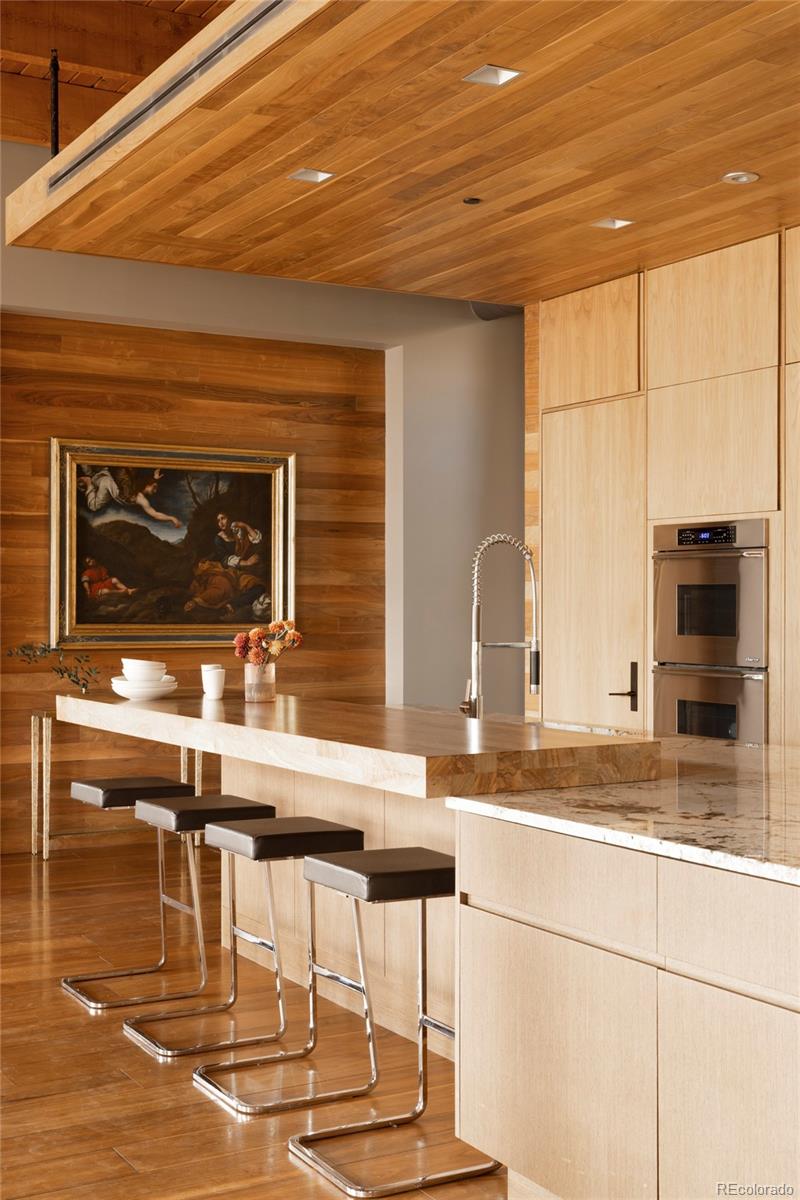 1500 Wynkoop Street, Unit PH1 Denver, CO 80202 - Photo 11 of 50 a kitchen with a sink and cabinets