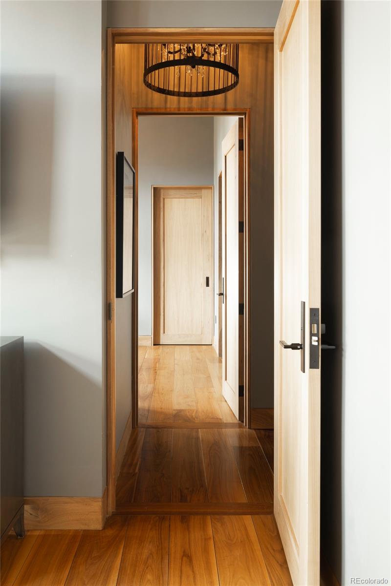 1500 Wynkoop Street, Unit PH1 Denver, CO 80202 - Photo 45 of 50 a view of a hallway with wooden floor