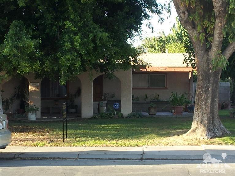 82192 Adobe Road Indio, CA 92201 - Photo 1 of 2 front view of house with a yard