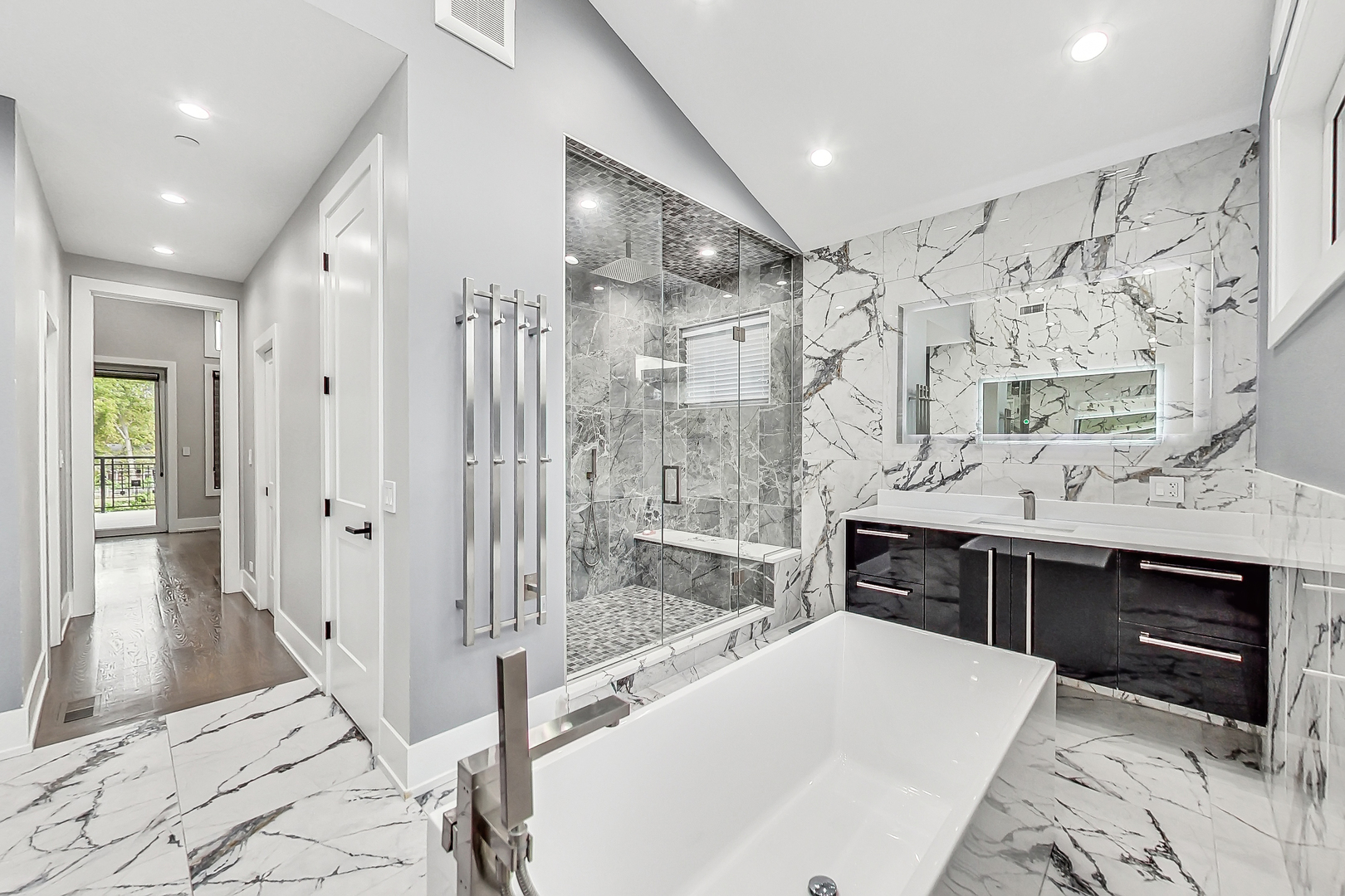 1331 Pfingsten Road Northbrook, IL 60062 - Photo 14 of 29 a spacious bathroom with a bathtub and a shower