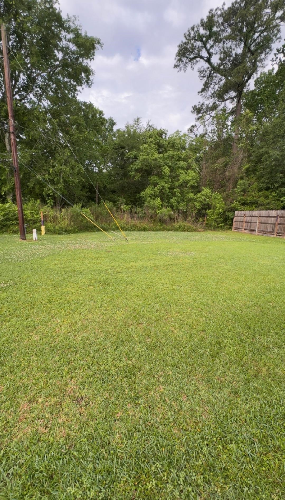 4665 Glen Oaks Circle Beaumont, TX 77708 - Photo 20 of 20 a view of an ocean and a yard