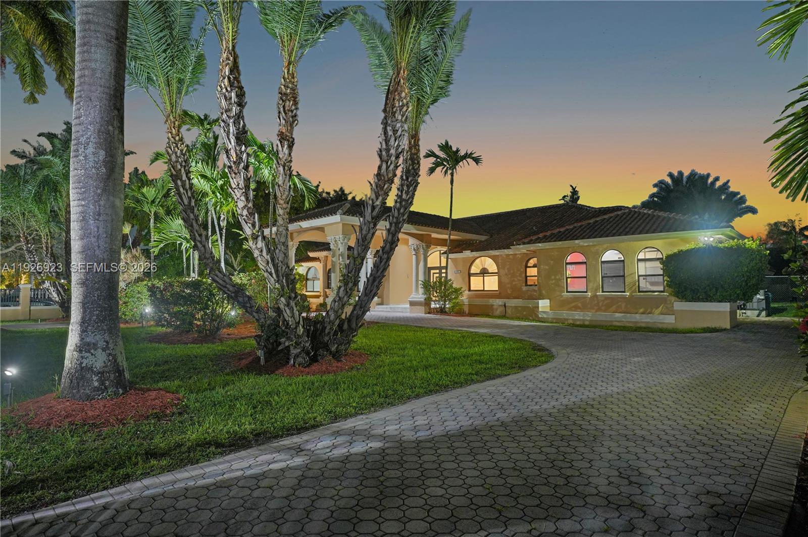 3001 Southwest 132nd Avenue Miami, FL 33175 - Photo 11 of 54 a front view of a house with garden