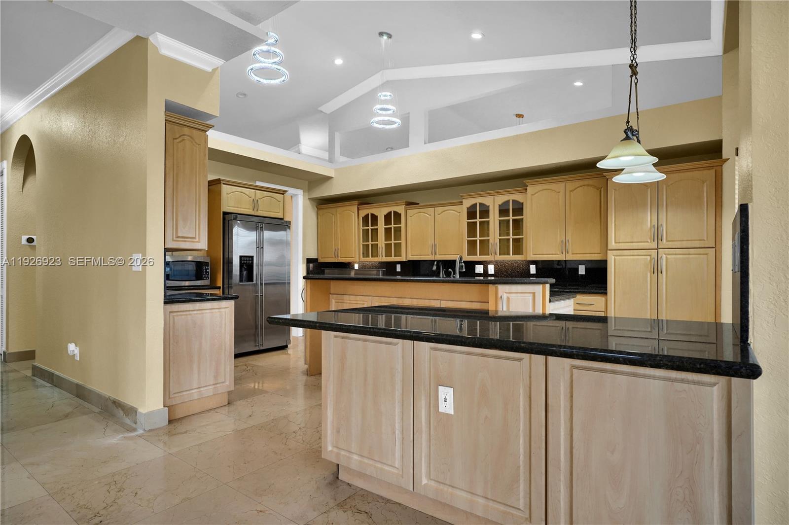 3001 Southwest 132nd Avenue Miami, FL 33175 - Photo 13 of 54 a large kitchen with a large counter top appliances and cabinets