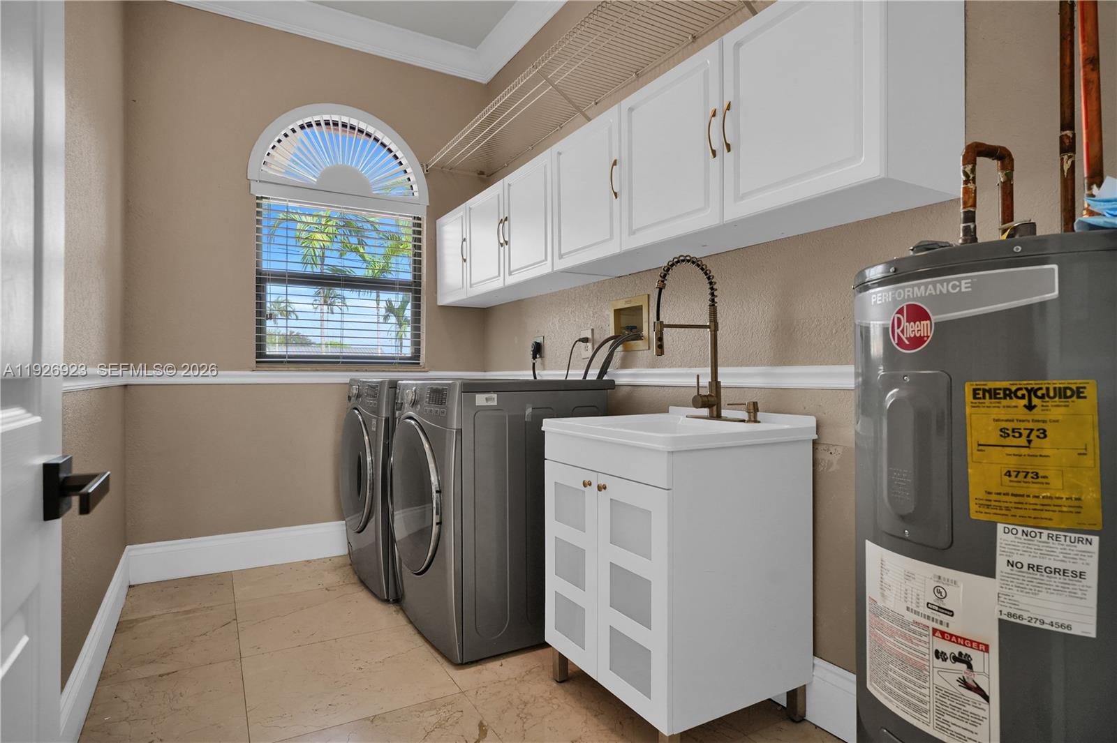 3001 Southwest 132nd Avenue Miami, FL 33175 - Photo 18 of 54 a utility room with dryer and washer