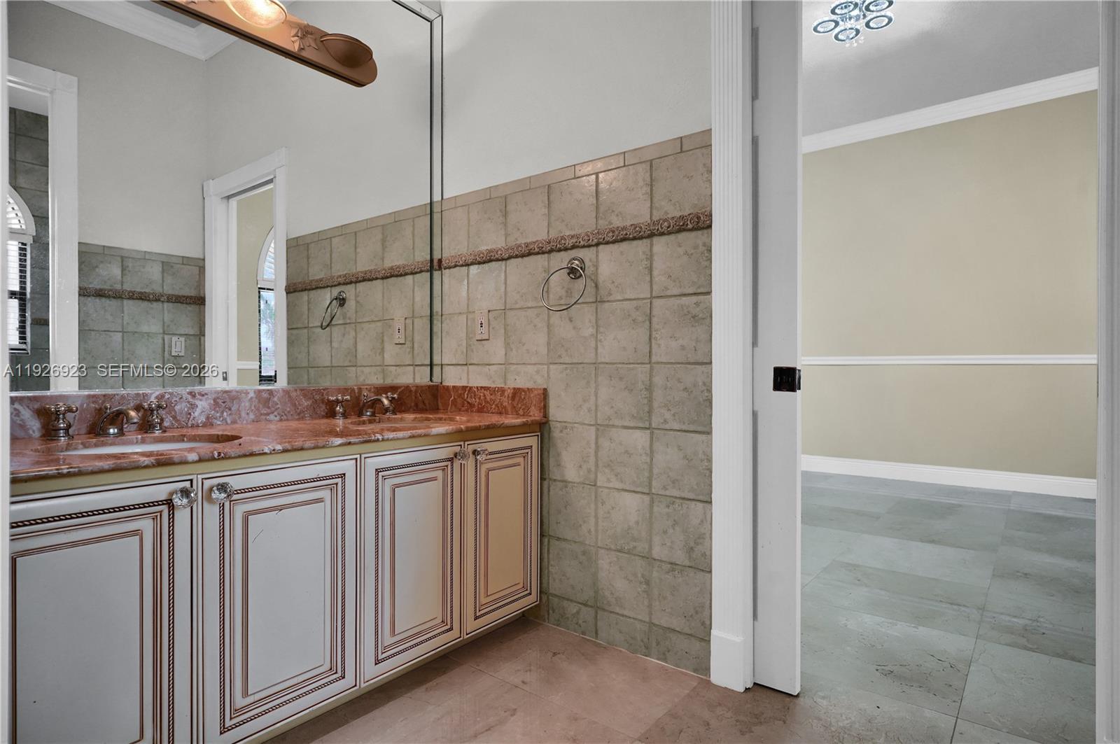 3001 Southwest 132nd Avenue Miami, FL 33175 - Photo 24 of 54 a bathroom with a double vanity sink and a shower