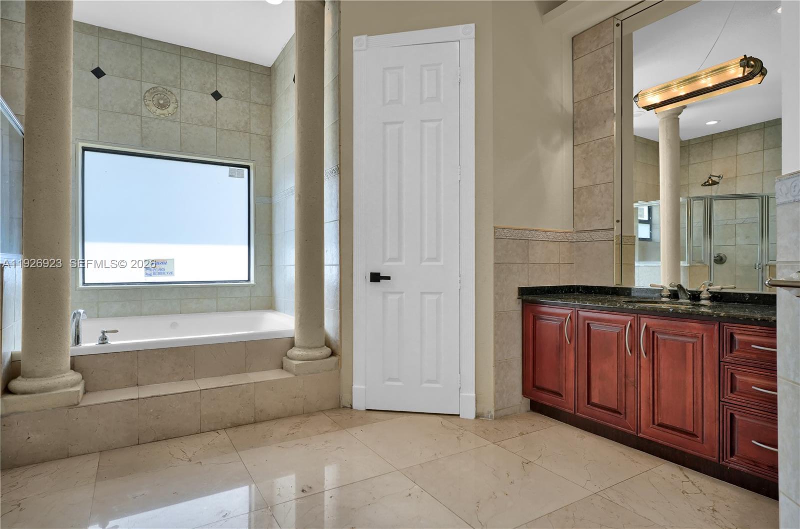 3001 Southwest 132nd Avenue Miami, FL 33175 - Photo 33 of 54 a bathroom with a tub sink and mirror