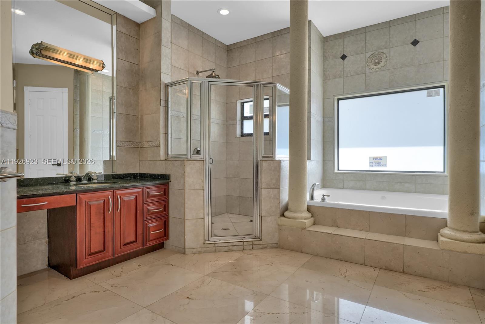 3001 Southwest 132nd Avenue Miami, FL 33175 - Photo 34 of 54 a bathroom with a tub sink and mirror