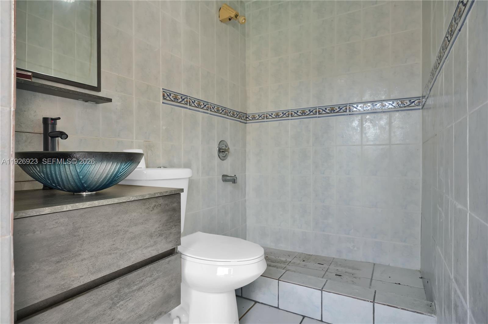 3001 Southwest 132nd Avenue Miami, FL 33175 - Photo 42 of 54 a bathroom with a toilet and a shower