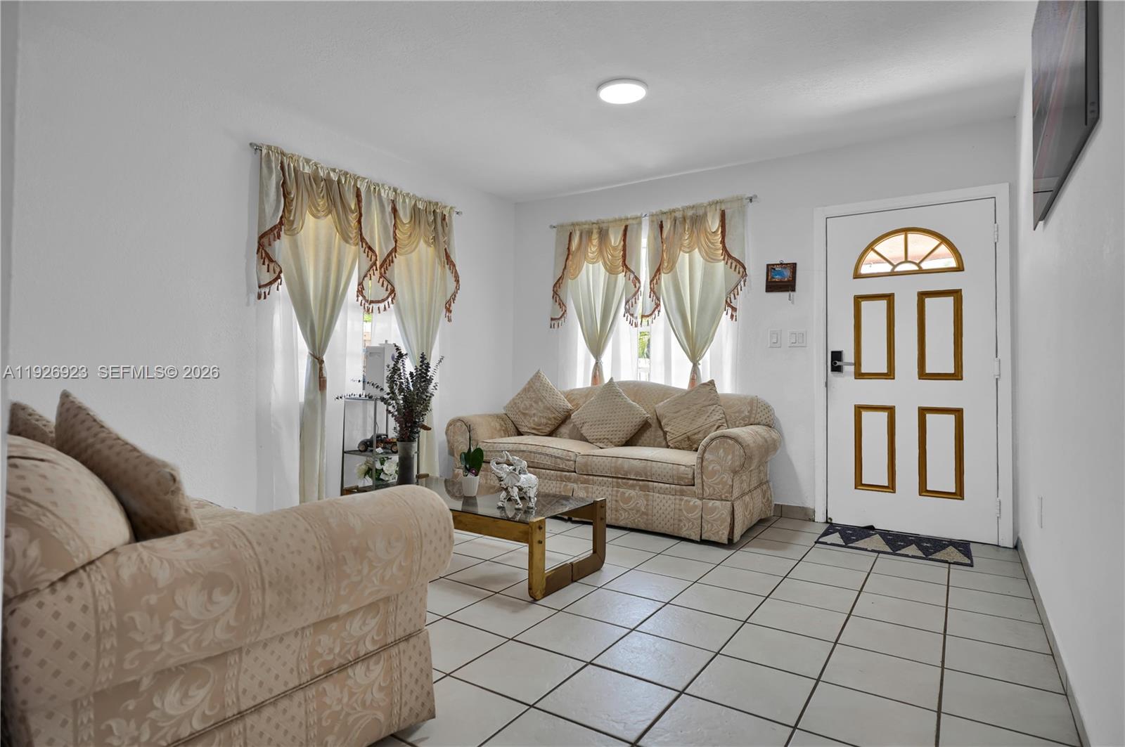 3001 Southwest 132nd Avenue Miami, FL 33175 - Photo 43 of 54 a living room with furniture and a window