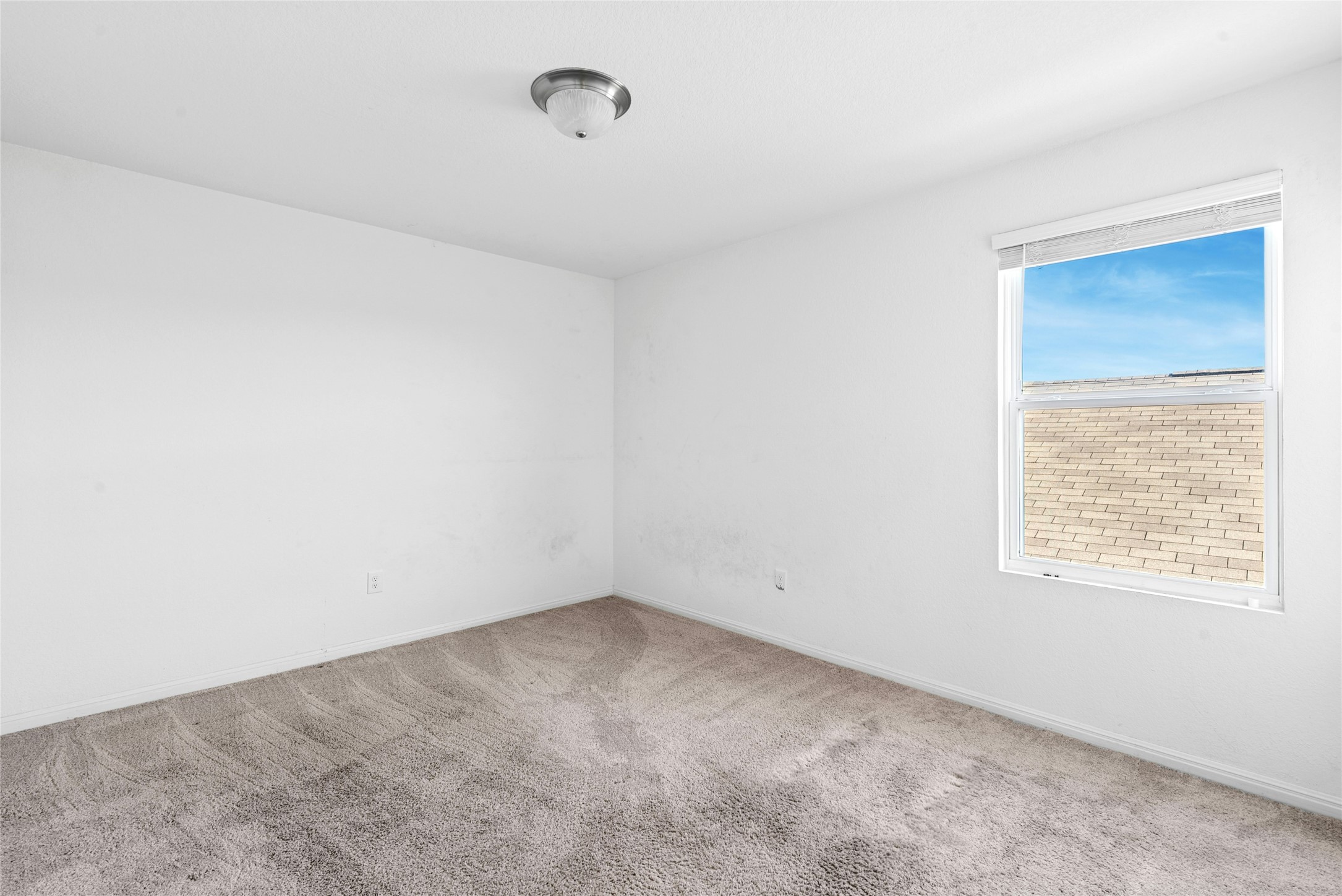 566 Delta Crest Maxwell, TX 78656 - Photo 16 of 27 Empty room featuring carpet flooring and baseboards