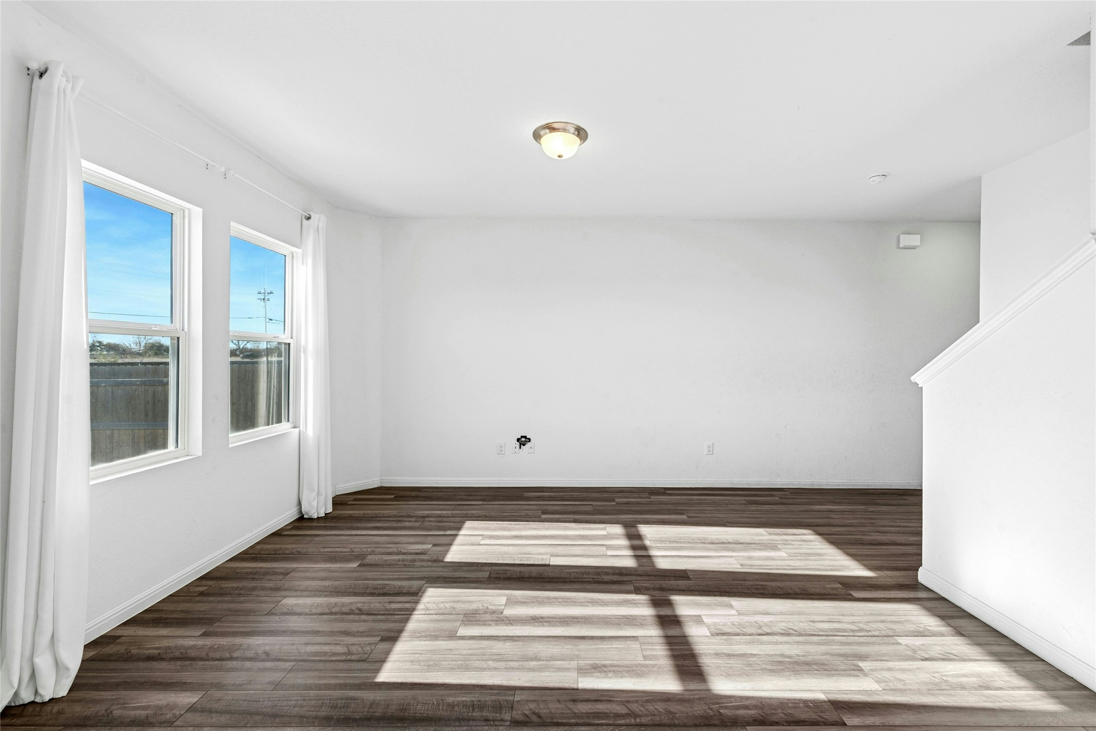 566 Delta Crest Maxwell, TX 78656 - Photo 5 of 27 Spare room featuring dark wood finished floors