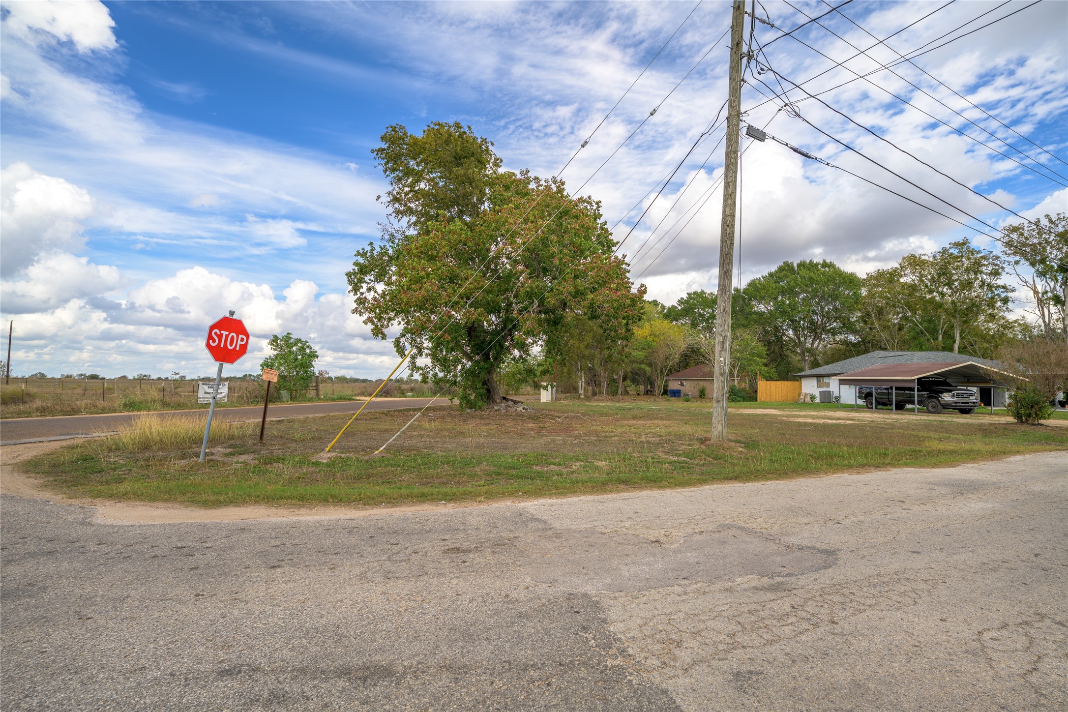 a view of a playground with basketball court