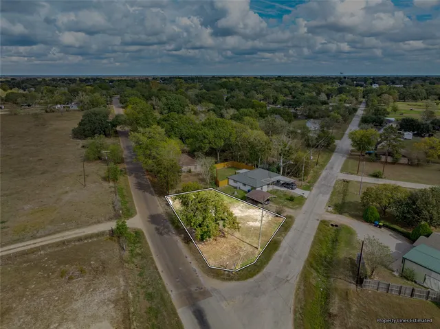 a view of a balcony with wooden floor and lake view