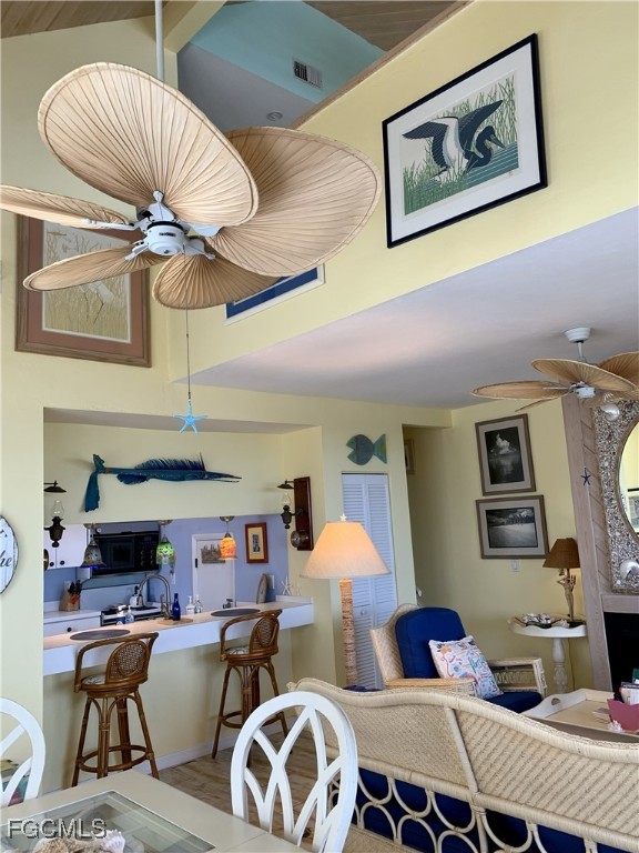 503 Useppa Useppa Island Bokeelia, FL 33922 - Photo 18 of 50 a living room with furniture and a wooden floor