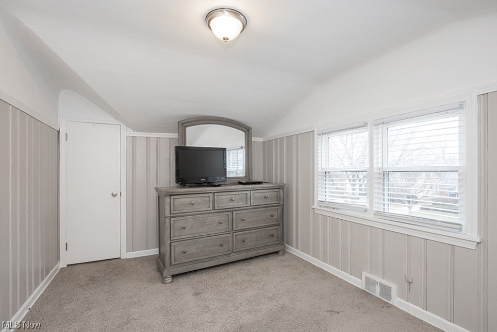 4242 Wyncote Road South Euclid, OH 44121 - Photo 14 of 22 Carpeted bedroom with vaulted ceiling