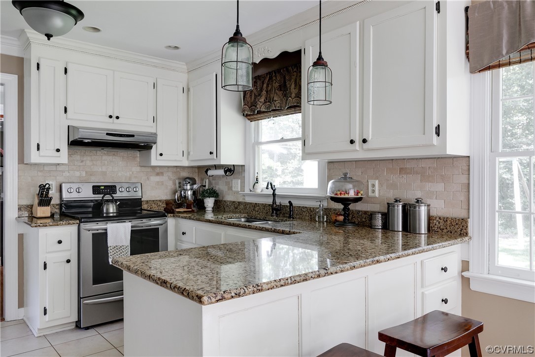 5709 Grove Forest Road Midlothian, VA 23112 - Photo 15 of 39 a kitchen with stainless steel appliances granite countertop a sink a stove and a granite counter tops