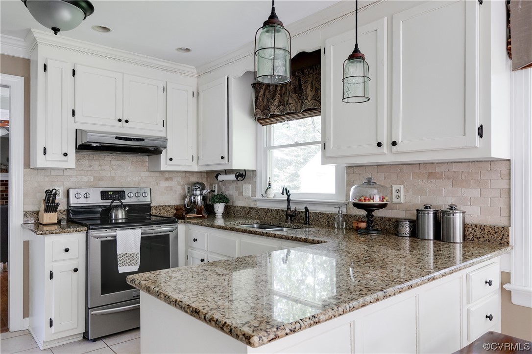 5709 Grove Forest Road Midlothian, VA 23112 - Photo 16 of 39 a kitchen with stainless steel appliances granite countertop a sink a stove and a granite counter tops