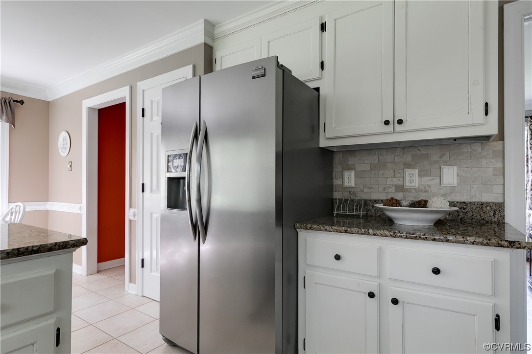5709 Grove Forest Road Midlothian, VA 23112 - Photo 19 of 39 a kitchen with stainless steel appliances granite countertop a refrigerator and a stove