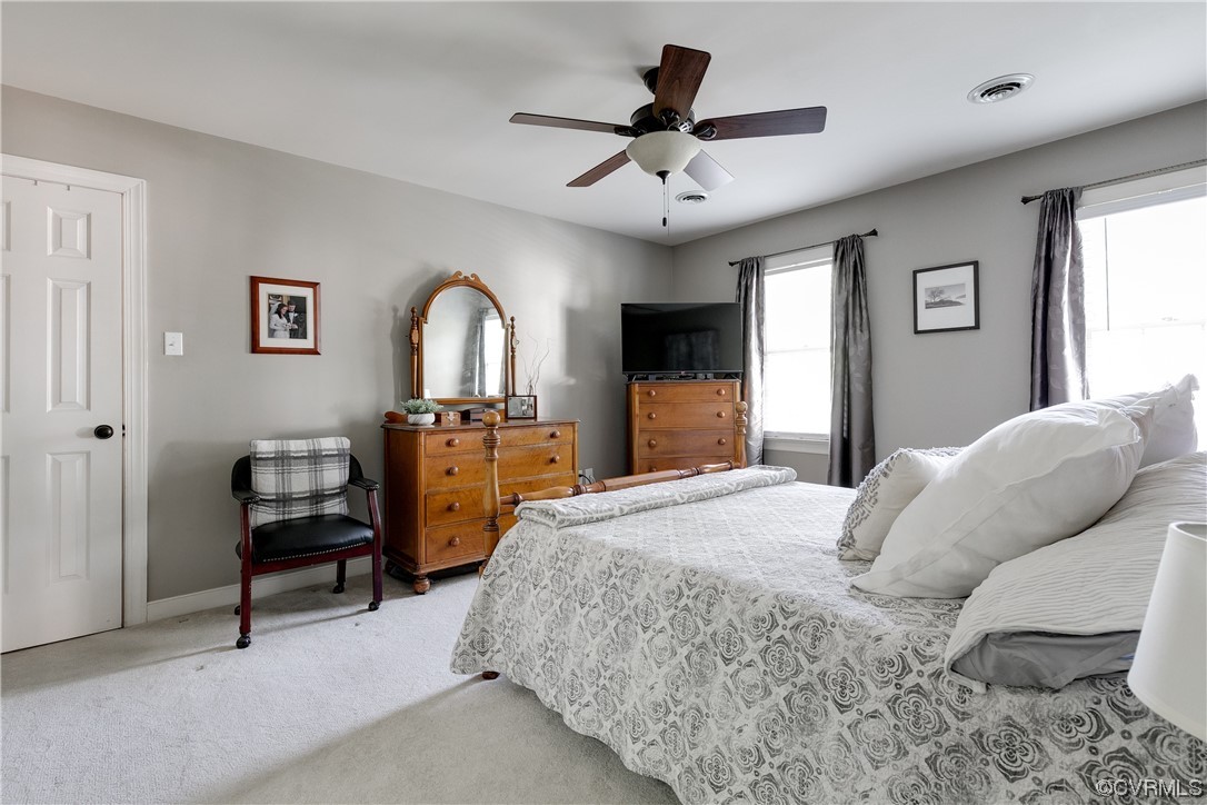 5709 Grove Forest Road Midlothian, VA 23112 - Photo 22 of 39 a bed room with a bed and a chair