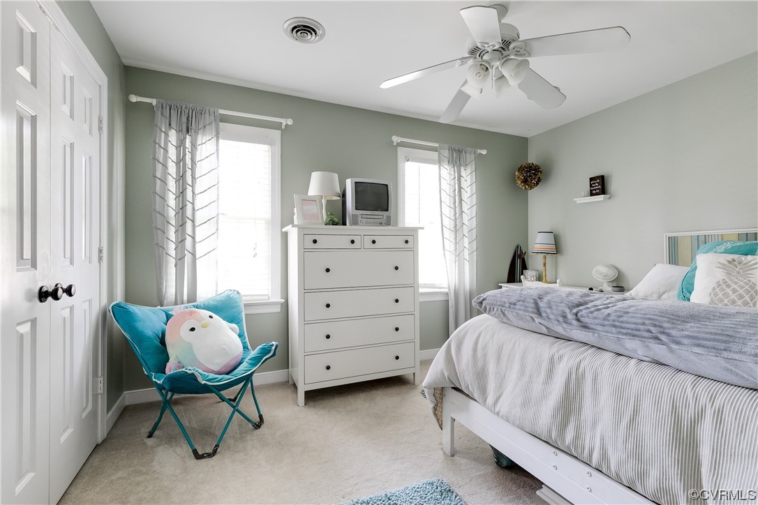 5709 Grove Forest Road Midlothian, VA 23112 - Photo 26 of 39 a bedroom with a bed and furniture