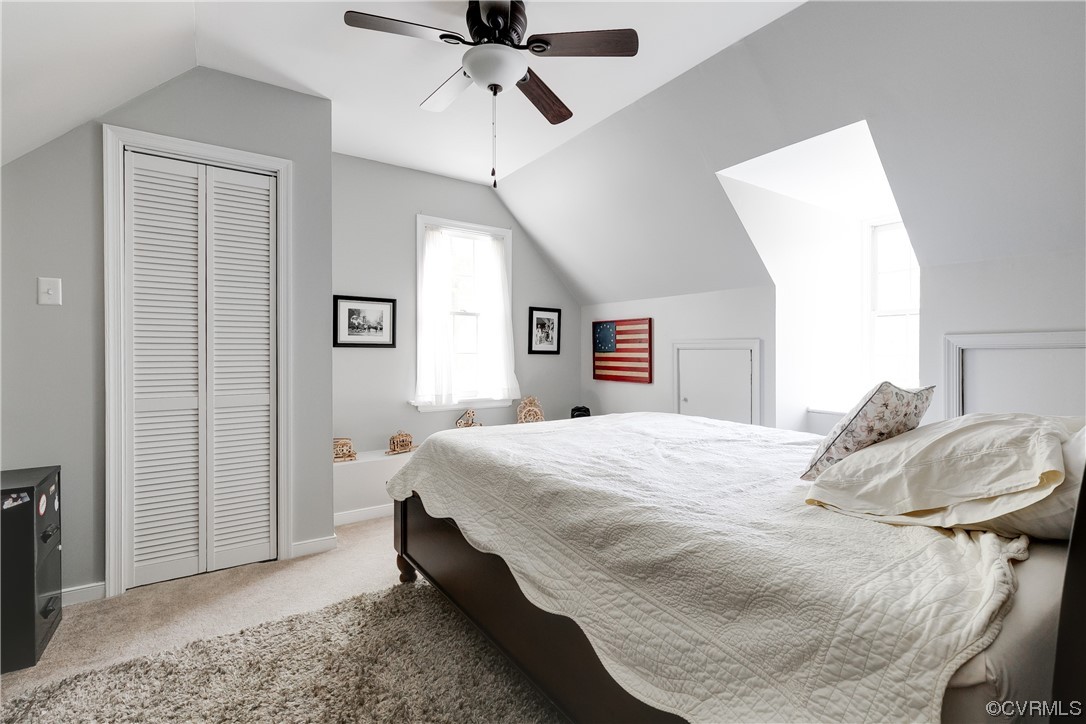 5709 Grove Forest Road Midlothian, VA 23112 - Photo 32 of 39 a bedroom with a bed and a chandelier