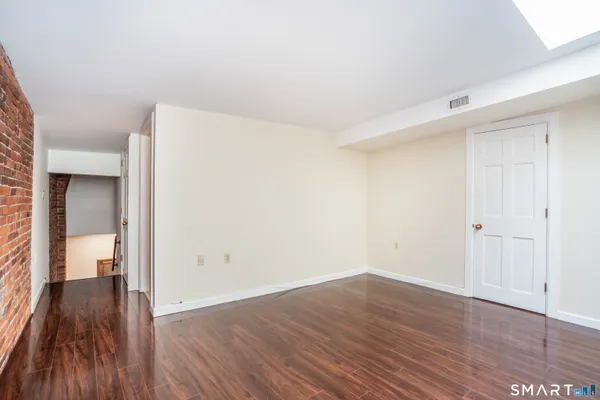 a view of a bathroom from the hallway