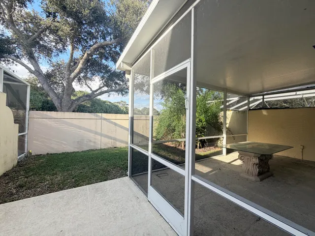 a view of backyard with green space