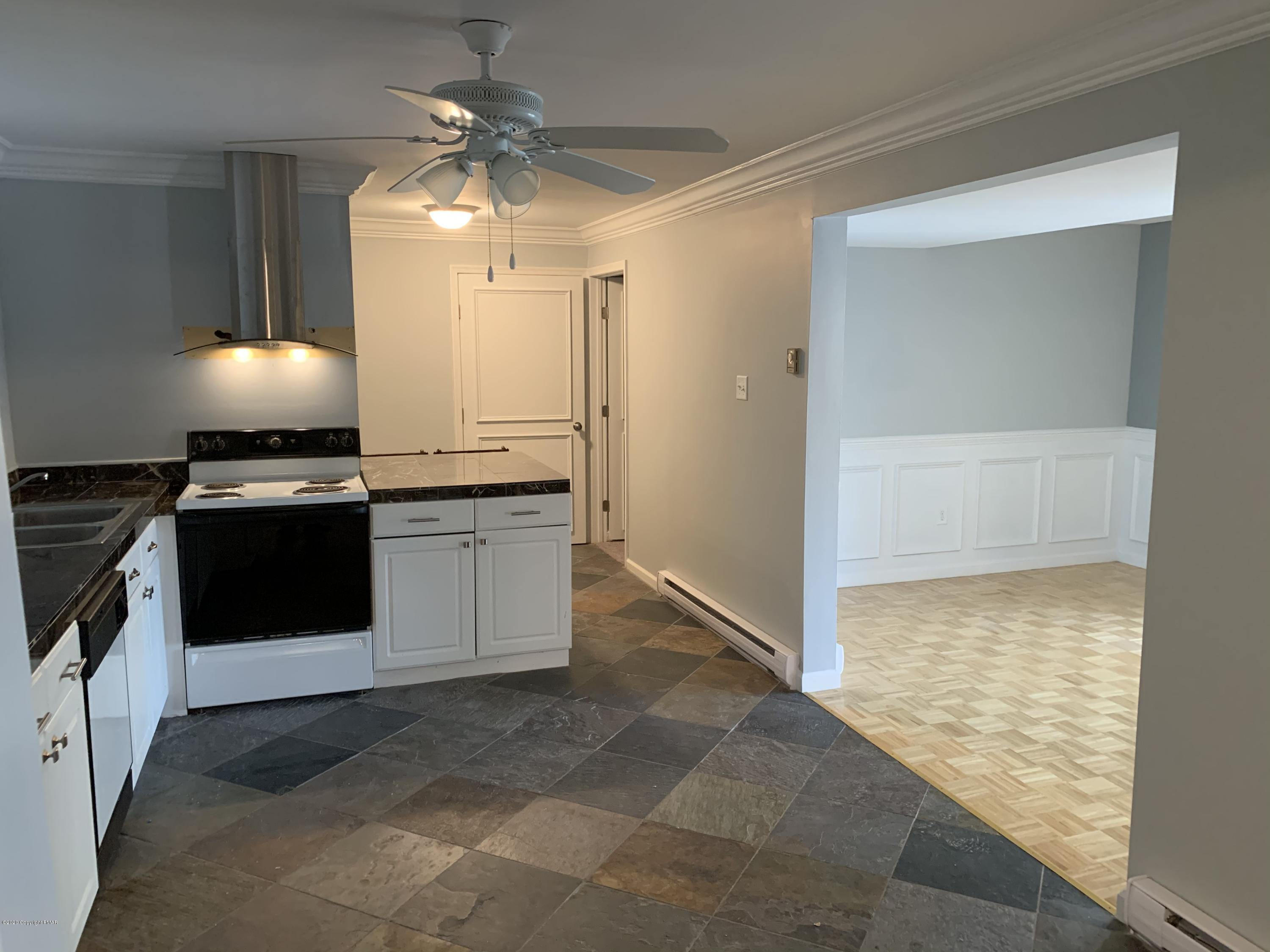 1697 Middle Road Stroudsburg, PA 18360 - Photo 116 of 116 a view of a kitchen with a sink and dishwasher