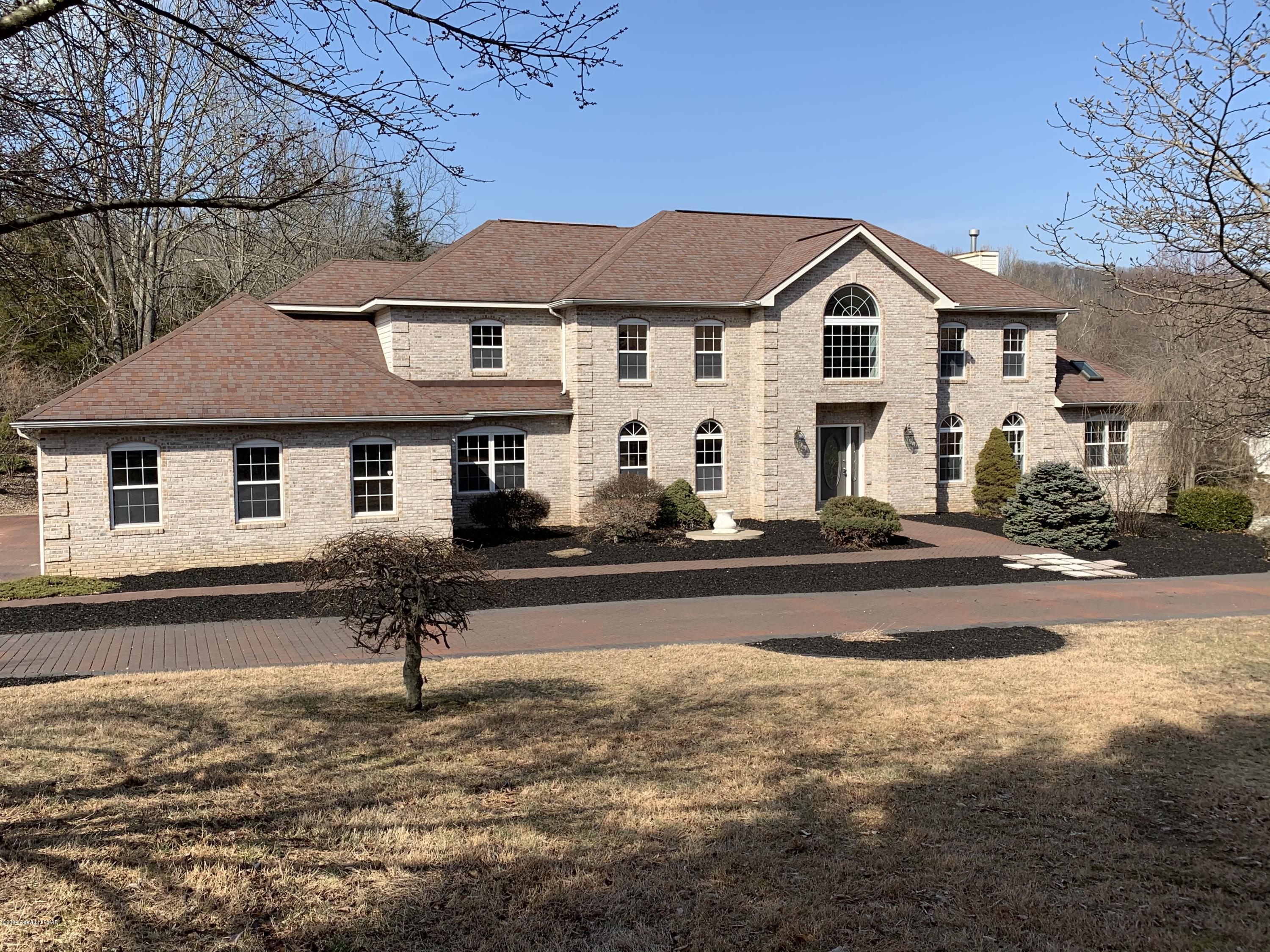 1697 Middle Road Stroudsburg, PA 18360 - Photo 2 of 116 a front view of house with street