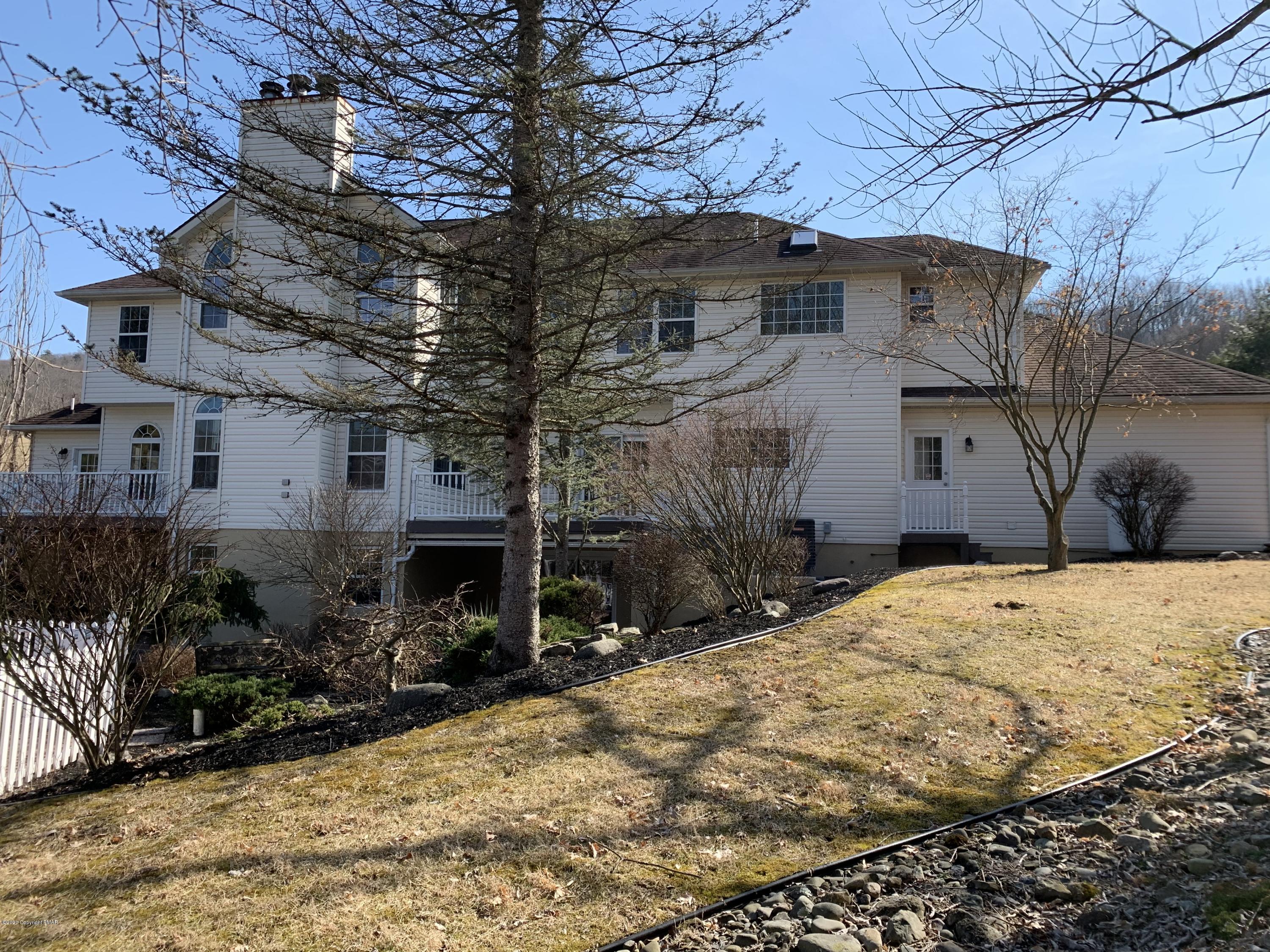 1697 Middle Road Stroudsburg, PA 18360 - Photo 30 of 116 a view of a house with snow on the background