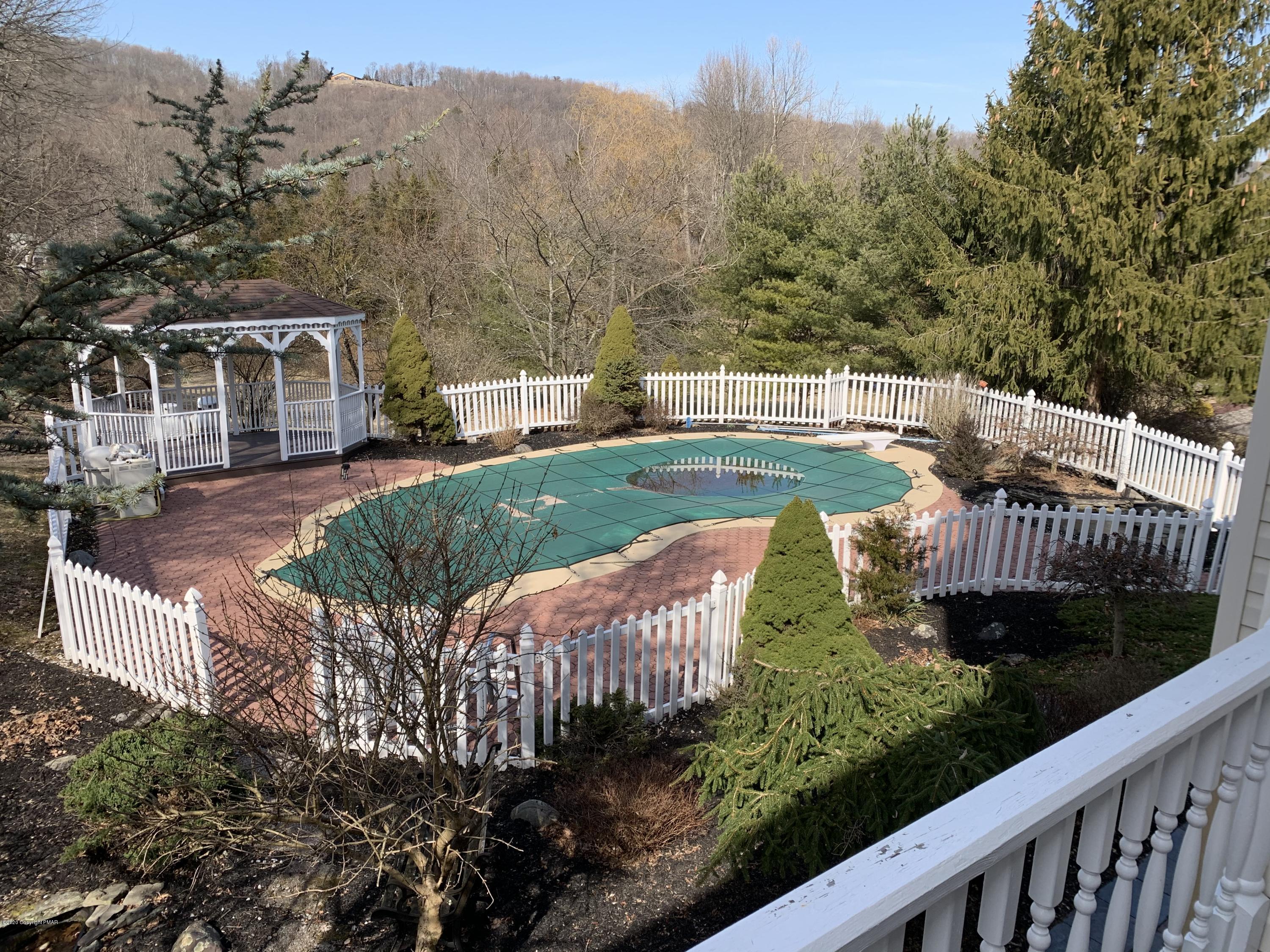 1697 Middle Road Stroudsburg, PA 18360 - Photo 50 of 116 a view of a house with backyard and sitting area