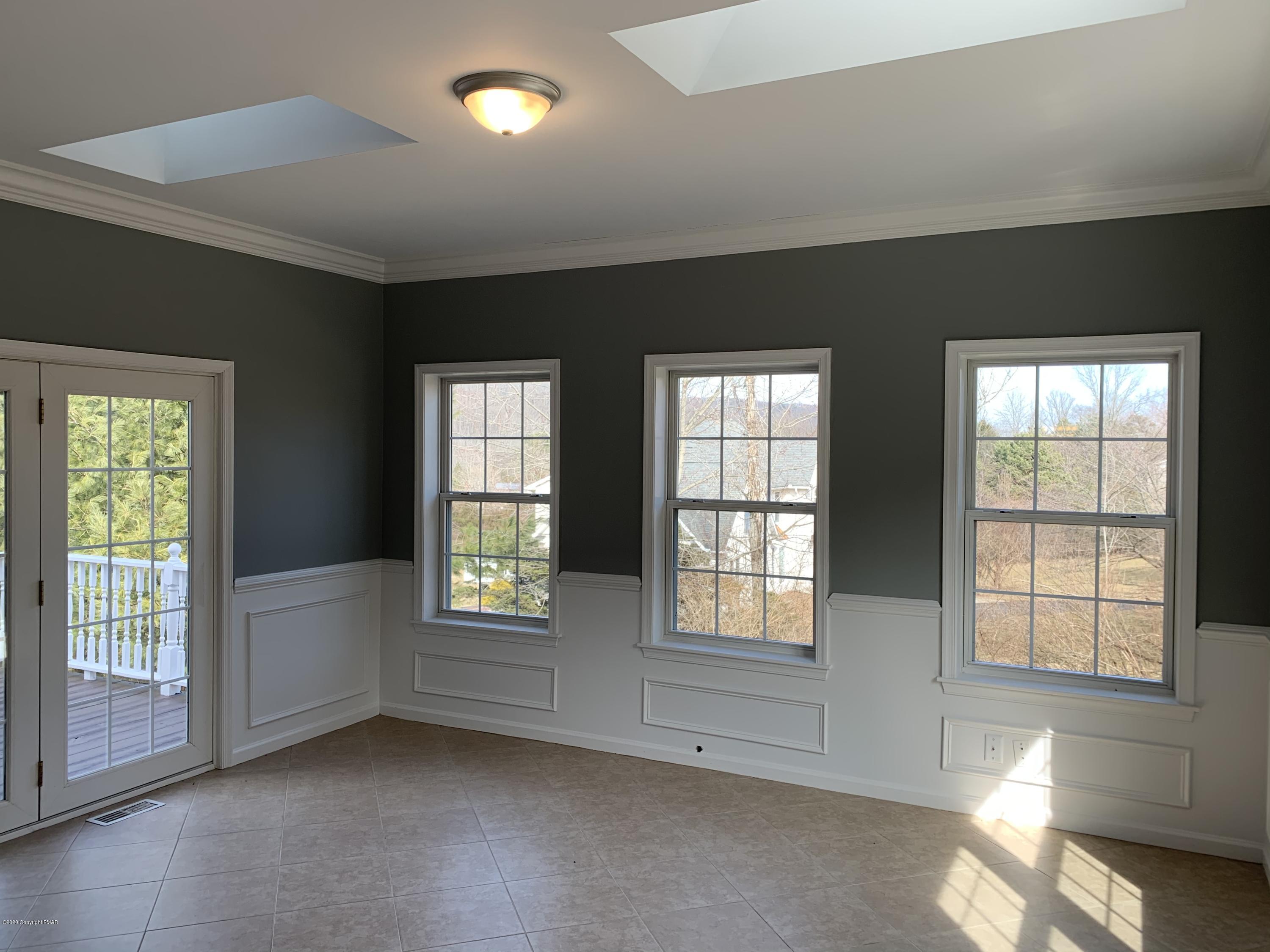 1697 Middle Road Stroudsburg, PA 18360 - Photo 65 of 116 an empty room with windows
