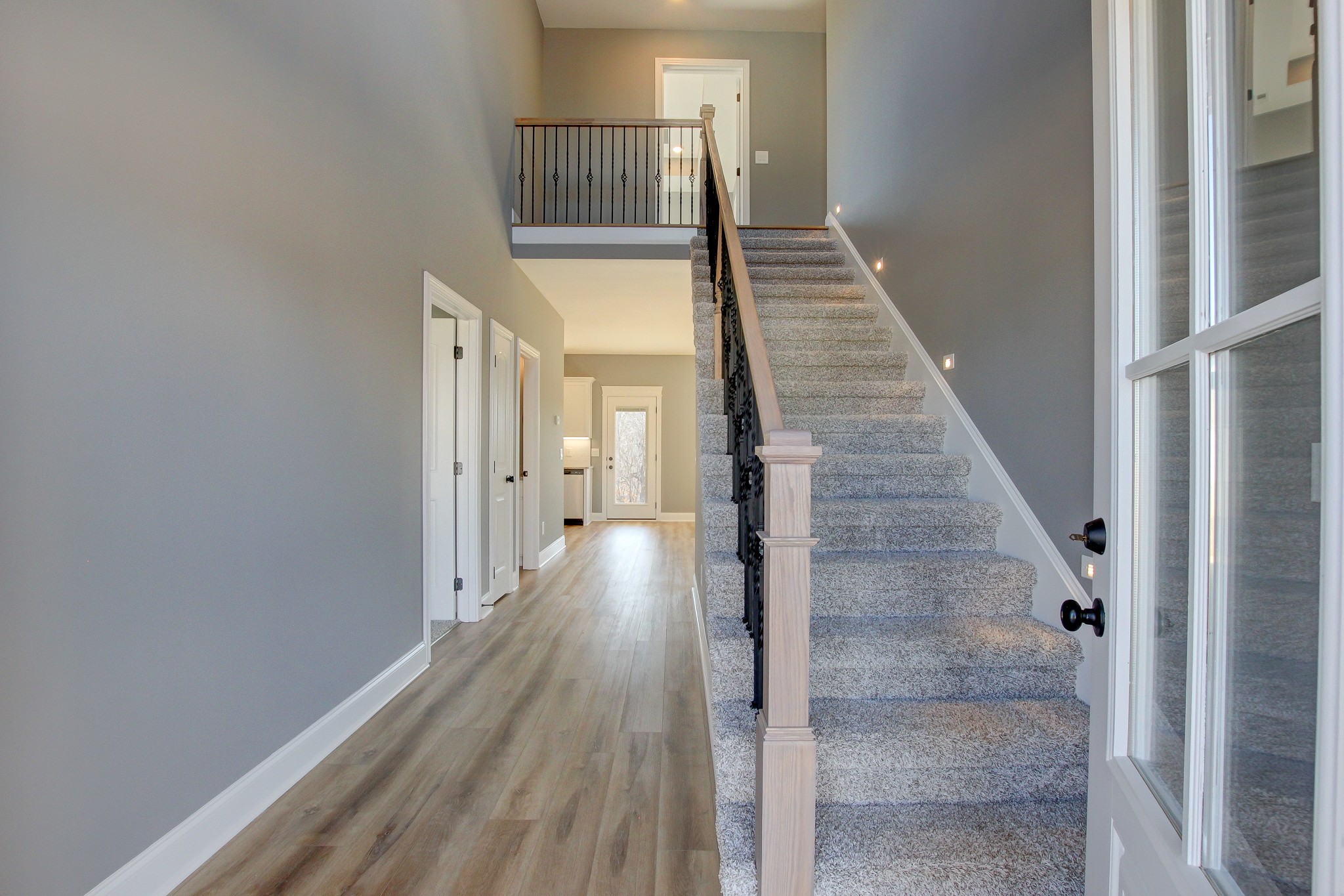 842 Burley Barn Road Clarksville, TN 37042 - Photo 17 of 49 a view of a hallway with wooden floor and entryway