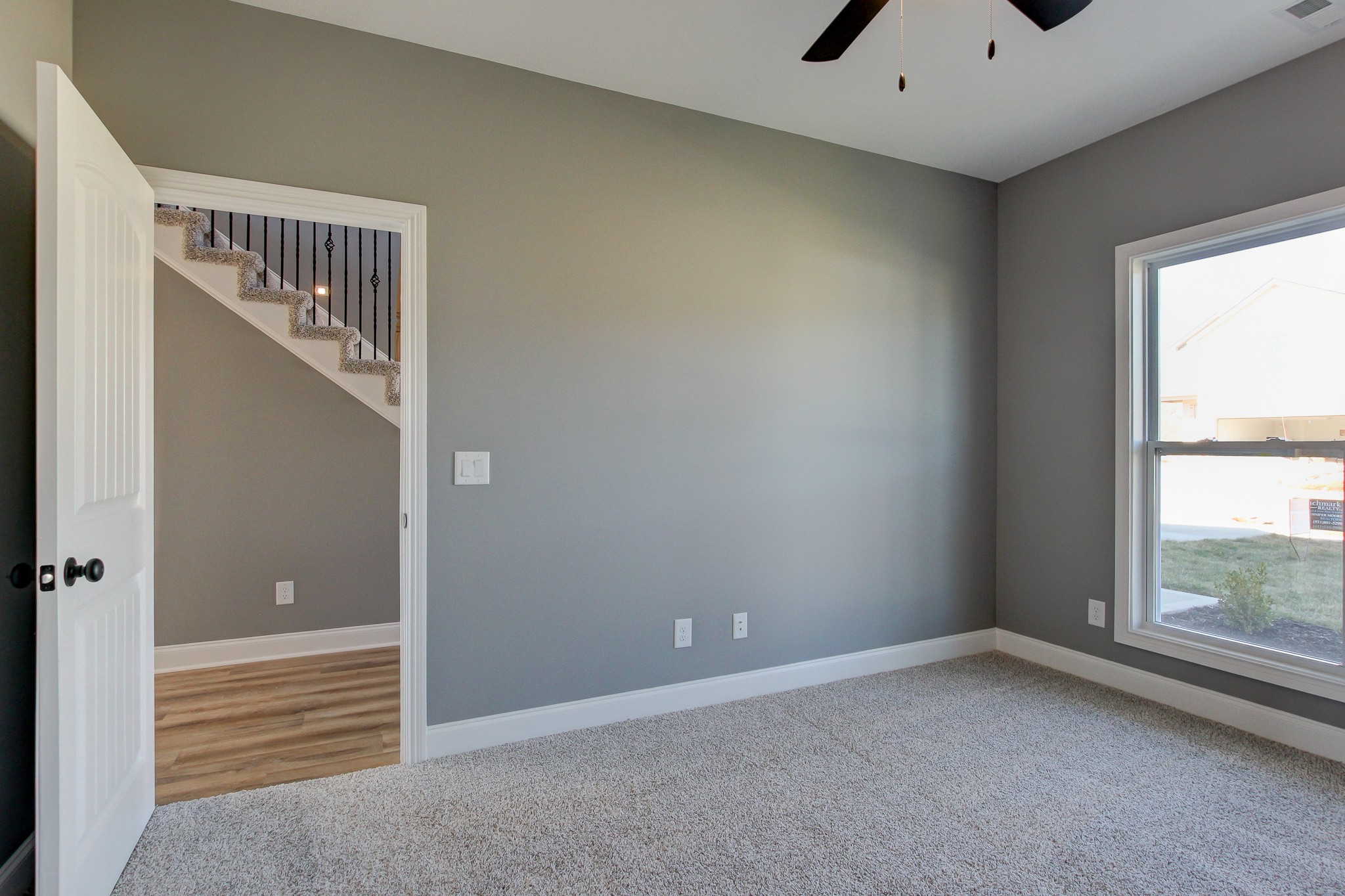 842 Burley Barn Road Clarksville, TN 37042 - Photo 18 of 49 a view of an empty room with windows