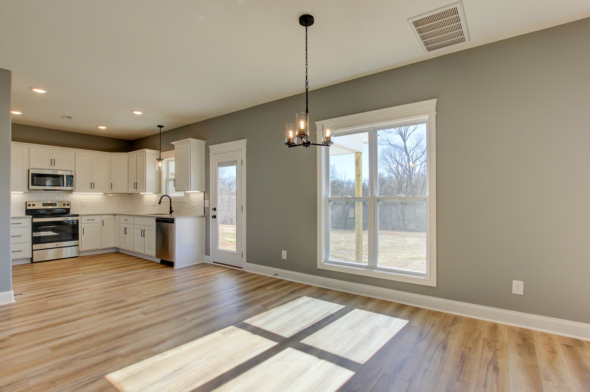 842 Burley Barn Road Clarksville, TN 37042 - Photo 20 of 49 a view of kitchen with wooden floor