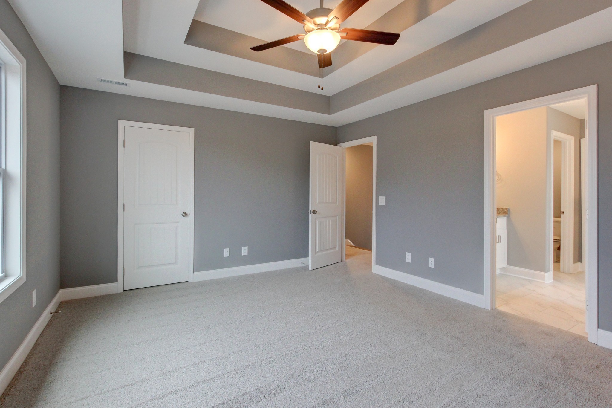 842 Burley Barn Road Clarksville, TN 37042 - Photo 23 of 49 an empty room with closet and a ceiling fan