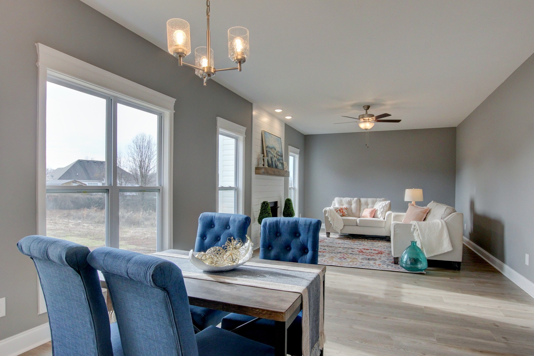 842 Burley Barn Road Clarksville, TN 37042 - Photo 8 of 49 a living room with furniture and a chandelier