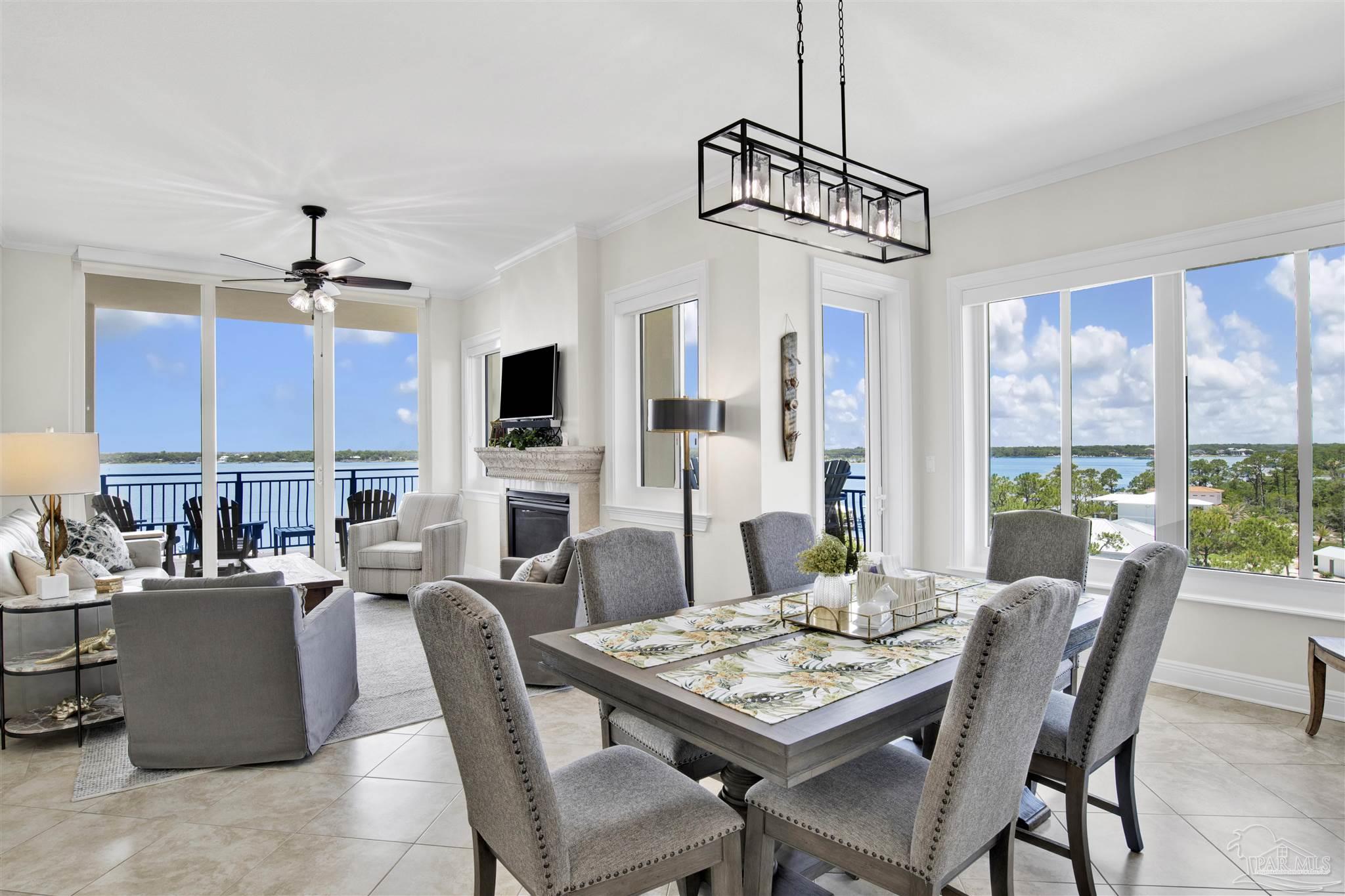 14500 River Road, Unit 507 Pensacola, FL 32507 - Photo 11 of 56 a view of a dining room with furniture window and outside view