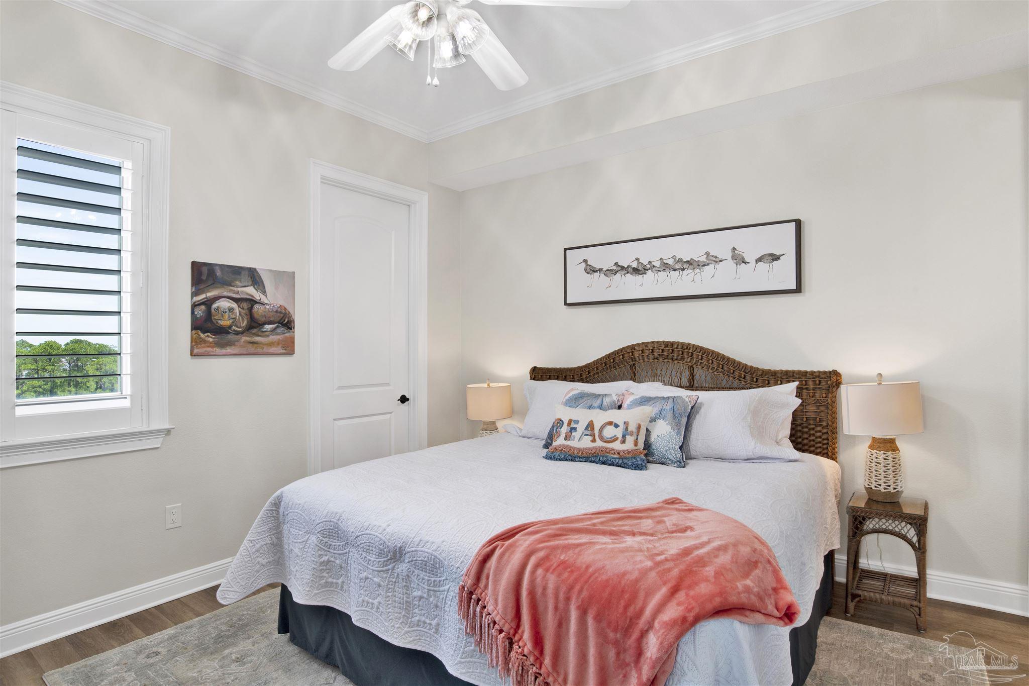 14500 River Road, Unit 507 Pensacola, FL 32507 - Photo 22 of 56 a bedroom with a bed and window