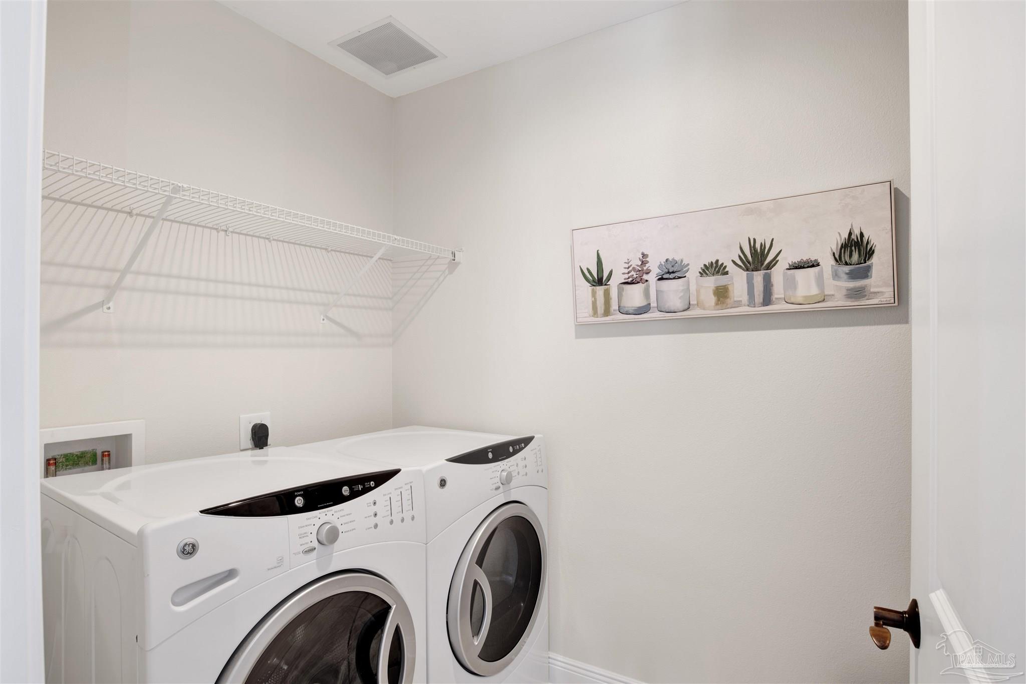 14500 River Road, Unit 507 Pensacola, FL 32507 - Photo 26 of 56 a utility room with dryer and washer