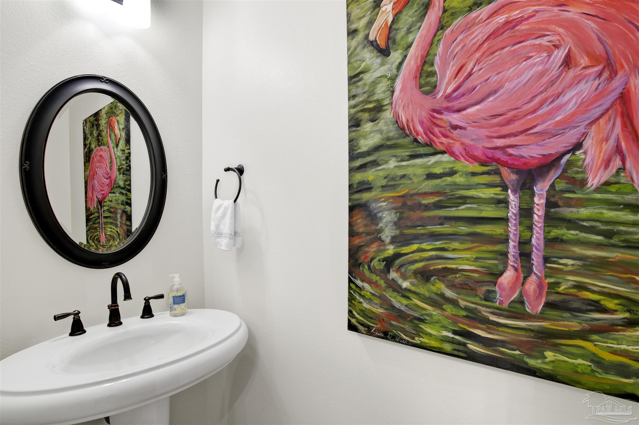 14500 River Road, Unit 507 Pensacola, FL 32507 - Photo 27 of 56 a bathroom with a sink and a mirror