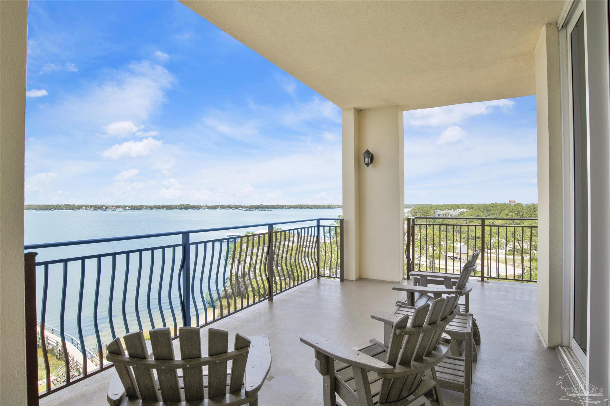14500 River Road, Unit 507 Pensacola, FL 32507 - Photo 29 of 56 a view of a city from a balcony with furniture