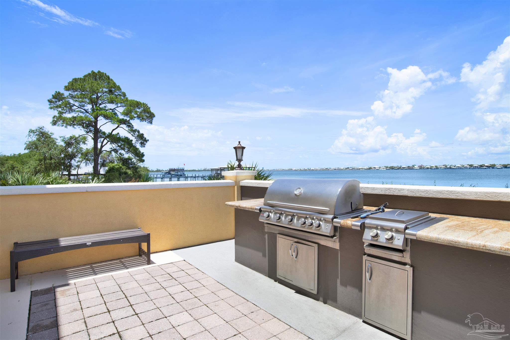14500 River Road, Unit 507 Pensacola, FL 32507 - Photo 37 of 56 a view of a terrace with chairs