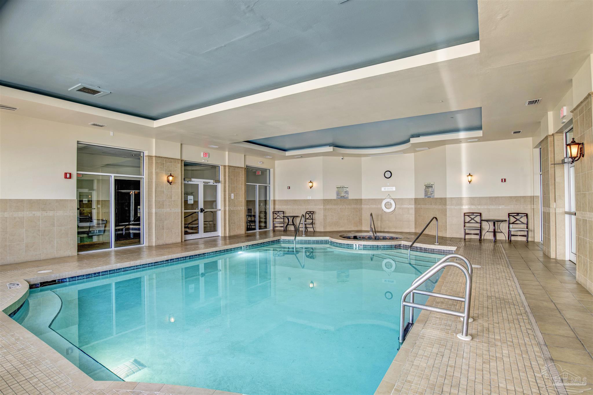 14500 River Road, Unit 507 Pensacola, FL 32507 - Photo 40 of 56 a swimming pool with outdoor seating and yard