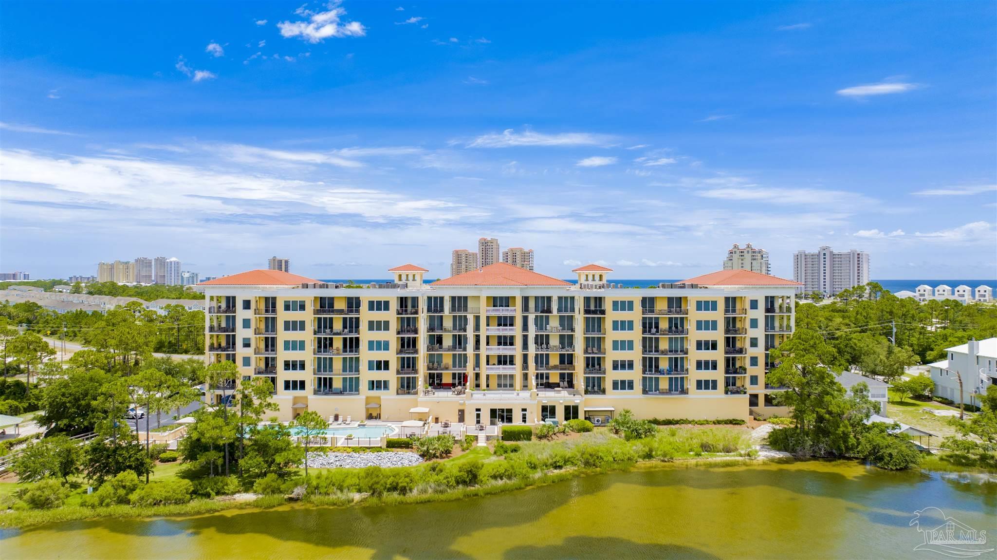 14500 River Road, Unit 507 Pensacola, FL 32507 - Photo 47 of 56 a view of a city with tall buildings in the background