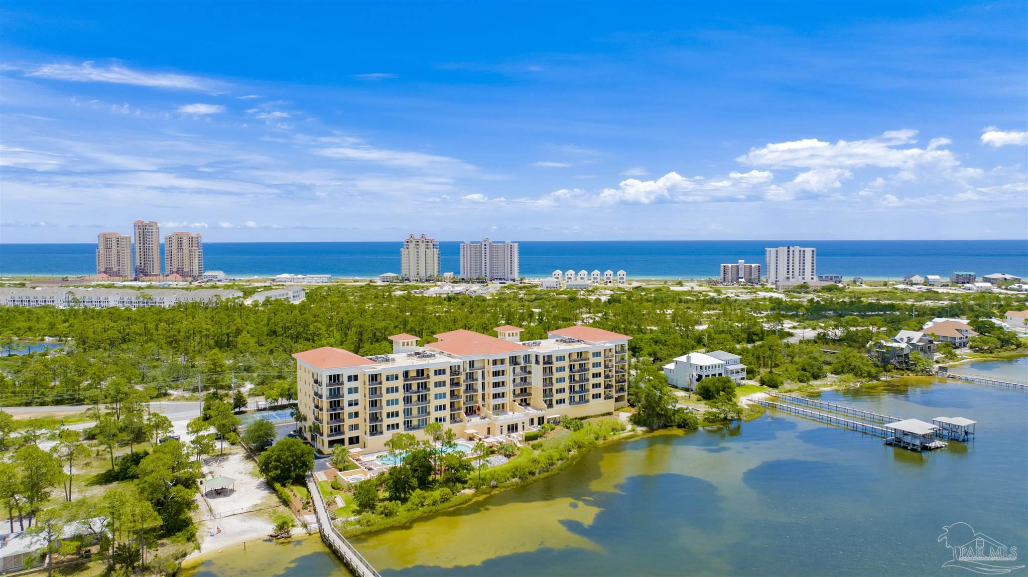 14500 River Road, Unit 507 Pensacola, FL 32507 - Photo 50 of 56 a view of a terrace with lawn chairs