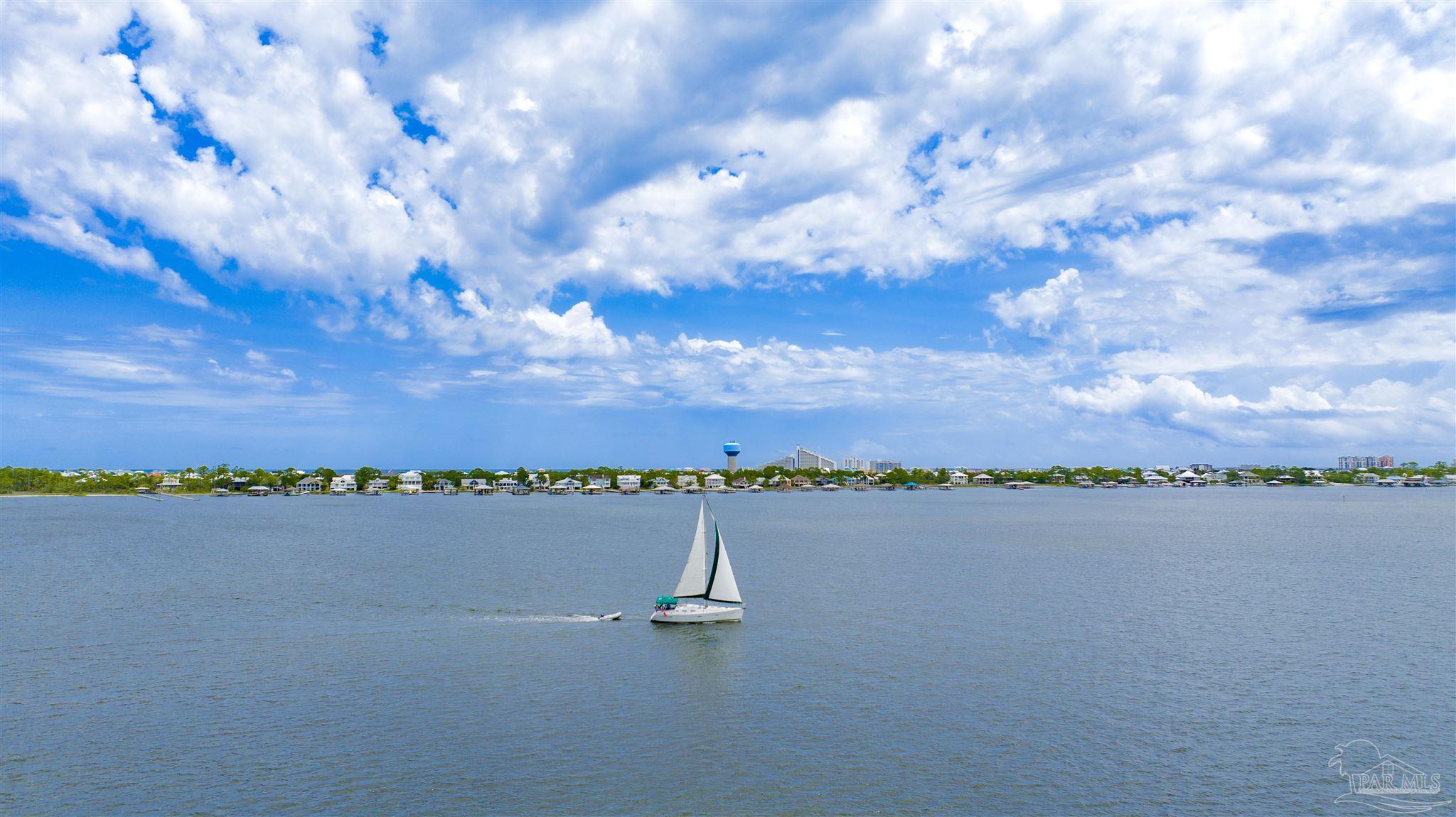 14500 River Road, Unit 507 Pensacola, FL 32507 - Photo 55 of 56 a view of a city with lake in background