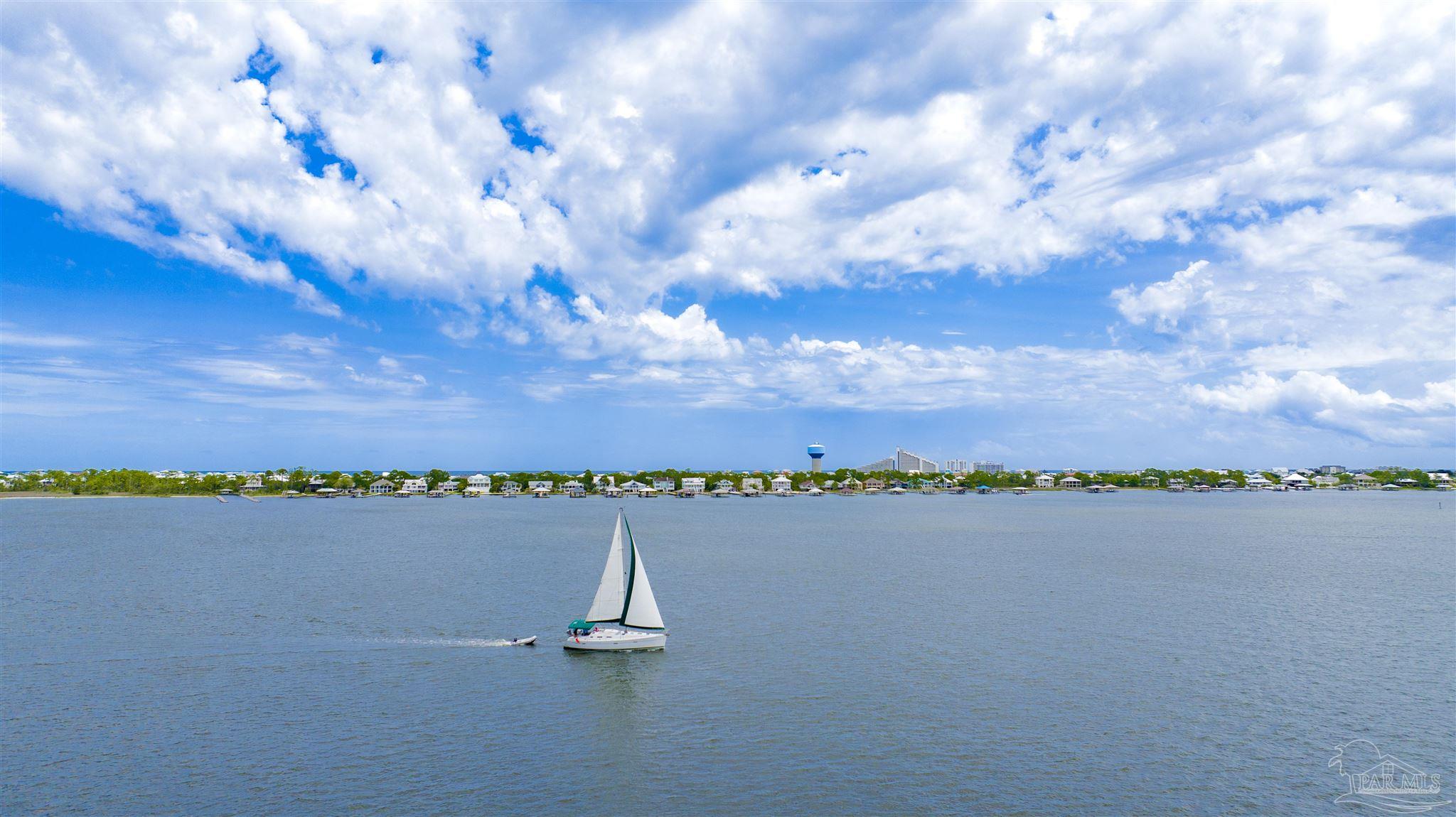 14500 River Road, Unit 507 Pensacola, FL 32507 - Photo 56 of 56 a view of a lake with a city in background