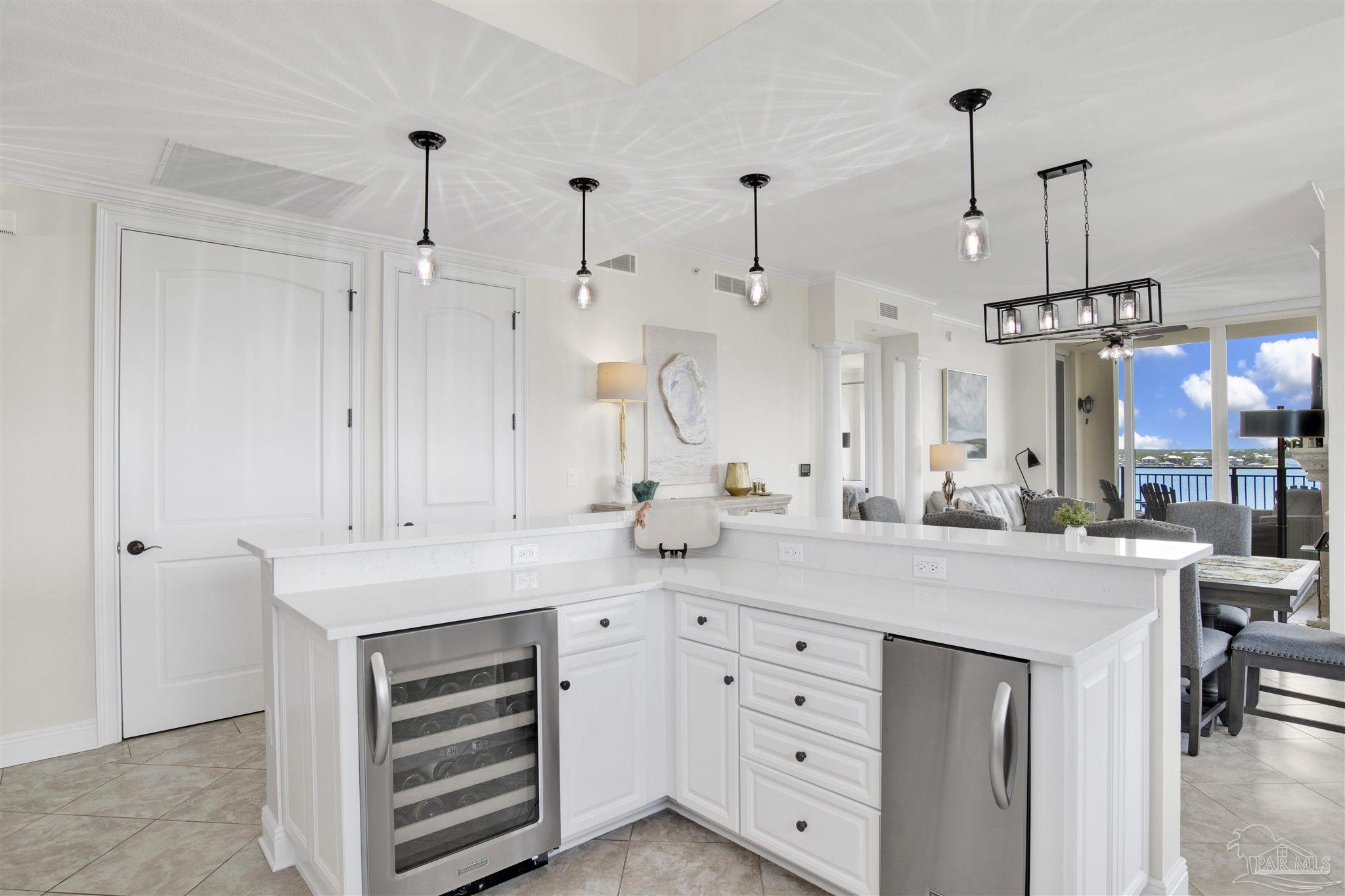 14500 River Road, Unit 507 Pensacola, FL 32507 - Photo 7 of 56 a view of kitchen with white cabinets